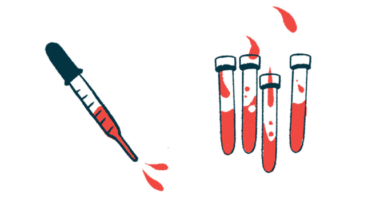 A dropper squirts blood alongside several vials of blood.