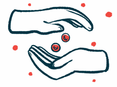 A downward-facing hand puts two coins into a cupped hand that's facing up.